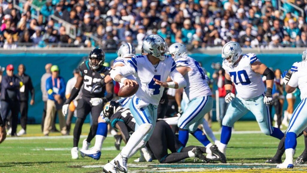 Dak Prescott playing on field.