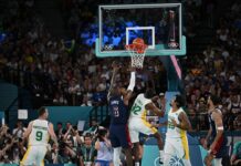 LeBron James surveys the defense during an NBA game.