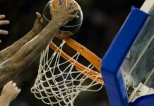 The Rise of Positionless Basketball and Its Long-Term Impact Man playing basketball.