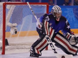 Olympic champion Team USA goalkeeper Nicole Hensley in action against Team Olympic Athlete from Russia during Women's ice hockey preliminary round game.
