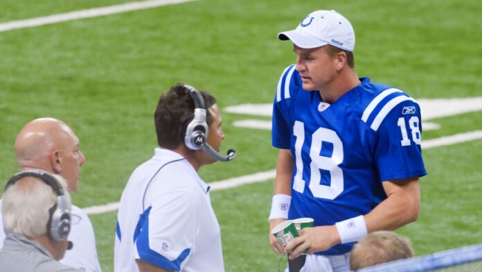 Peyton Manning, Indianapolis Colts quarterback, watches the game between Indianapolis Colts and Cincinnati Bengals.