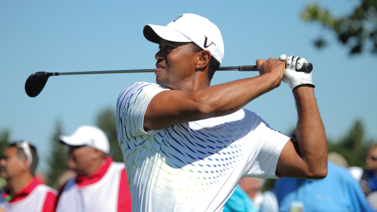 Tiger Woods joins fellow Stanford room mate Notah Begay III at Atunyote golf course.
