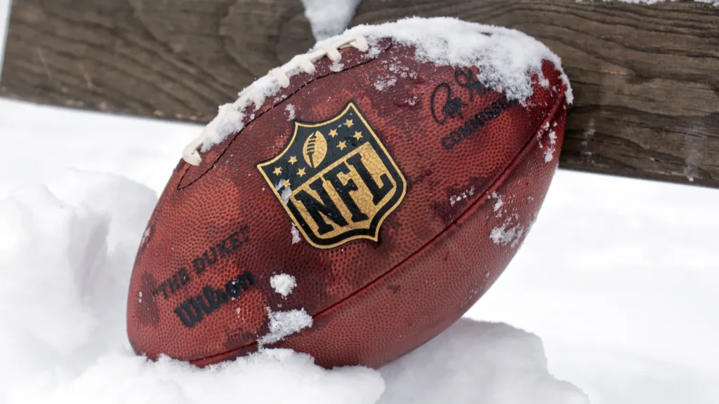 official ball of nfl in the snow - Gameday Chatter Official ball of NFL in the snow.
