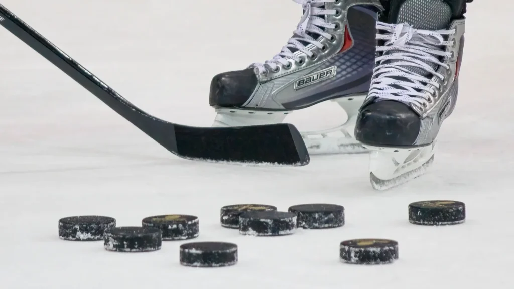 A closeup of hockey pucks.