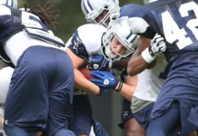 Why Offensive Line Play Decides More Games Than NFL Fans Realize chris gronkowski tries to break a tackle during the second