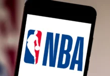 Offseason Workouts That Keep NBA Players in the Game Longer NBA logo displayed on a phone