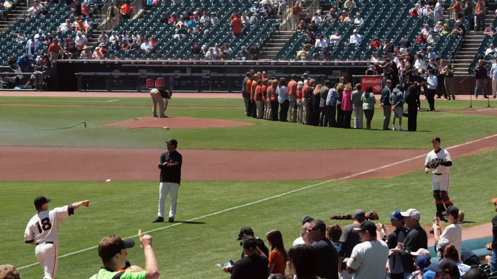 pitcher matt cain warms as he throws to catcher buster