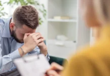 The Role of Mental Coaching in Modern Baseball Psychologist making notes during a therapy session.