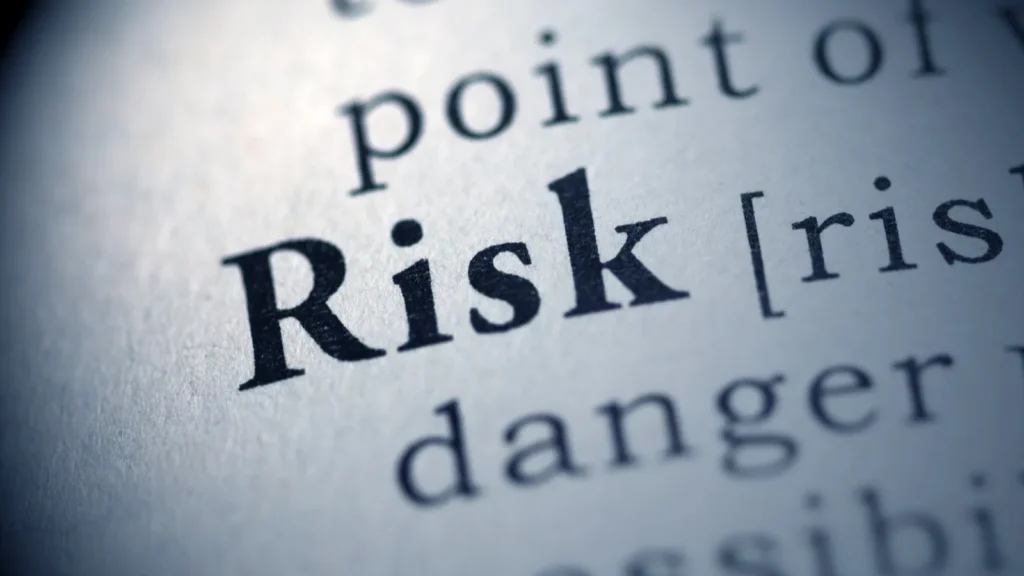 Risk written in book. 