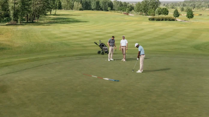 sportsmen playing golf Sportsmen playing golf.