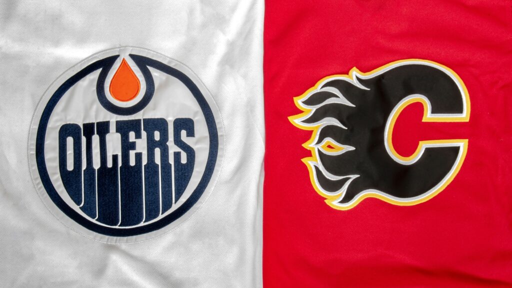 A close up to a NHL Edmonton Oilers vs Calgary Flames hockey jersey.