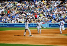 The Yankees are winning, but playoff doubts are back New York Yankees second baseman Robinson Cano and shortstop Derek Jeter turn a double play ahead of Dodger outfielder Andre Ethier