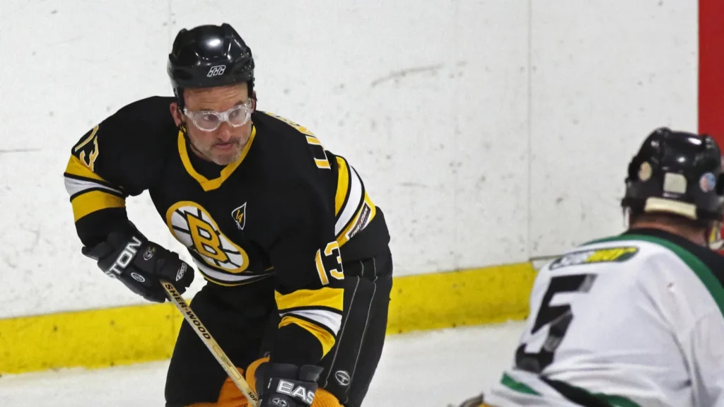 Boston Bruins alumni Ken Linseman skating during the game.