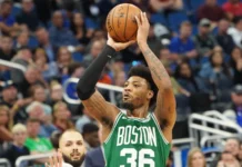 How the NBA’s three-point revolution changed the league forever Boston Celtics player, Marcus Smart, 36 shoots a three point shot.