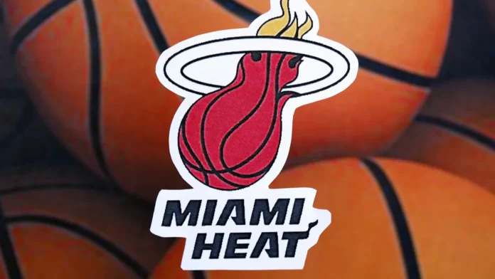 Basket ball team, Miami Heat logo against basket balls.