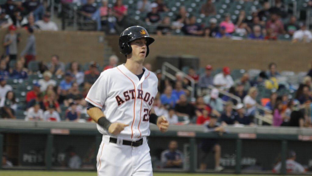 Kyle Tucker running on the field during a baseball game.