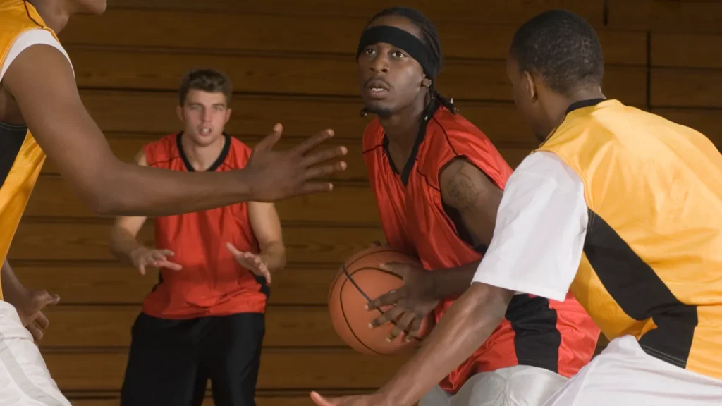 Basketball match on court.