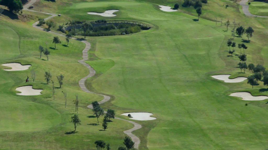 Aerial view of golf course showing strategic bunker placement and hole layout.