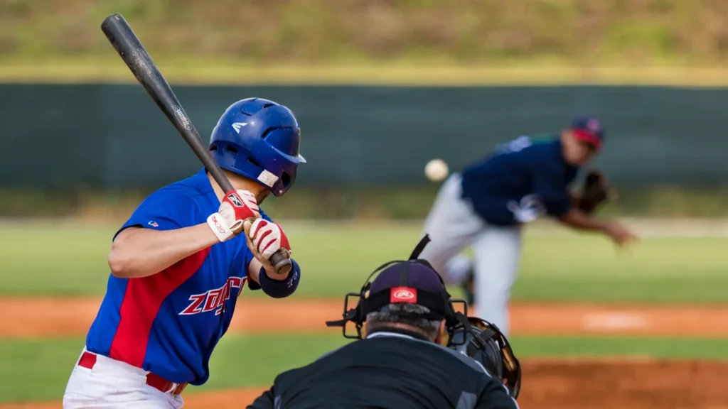 Baseball players playing baseball match.