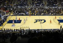 Mavericks 14-14 at home aim to snap 3-game skid against Celtics player dribbles ball down court