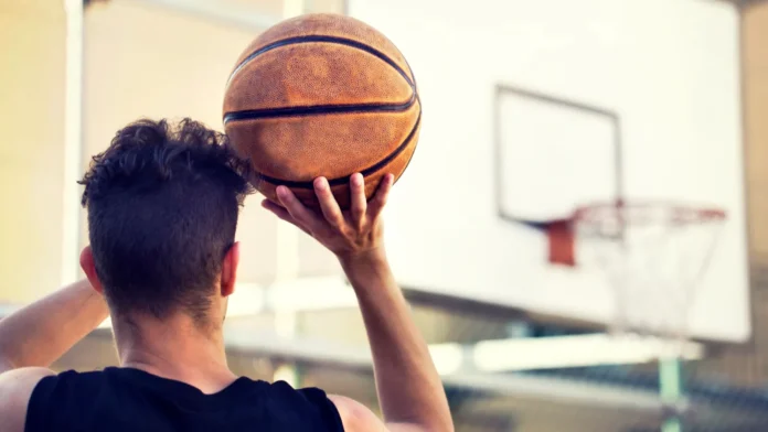 young basketball player ready to shoot