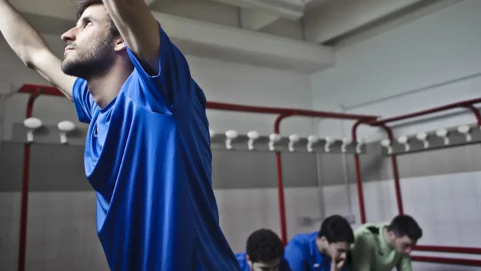 4 football players in the changing room
