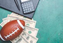 How Indiana’s billion dollar plan could reshape where the Bears play Football with dollar bills and a calculator kept on the green surface.
