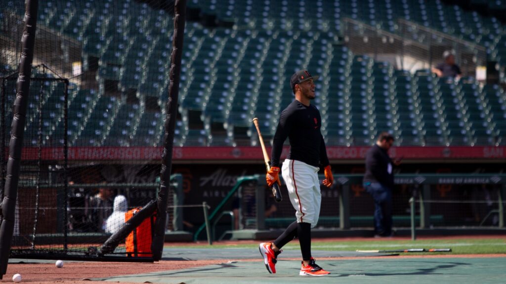 Thairo Estrada on the field during batting practice.