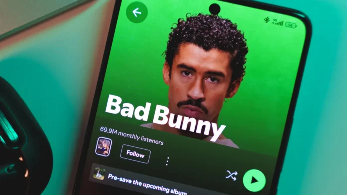 a smartphone displaying bad bunnys artist profile on spotify january