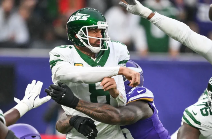 Aaron Rodgers hit by an opponent player during the game