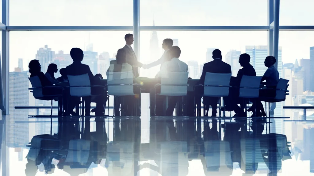 Business people in board room.