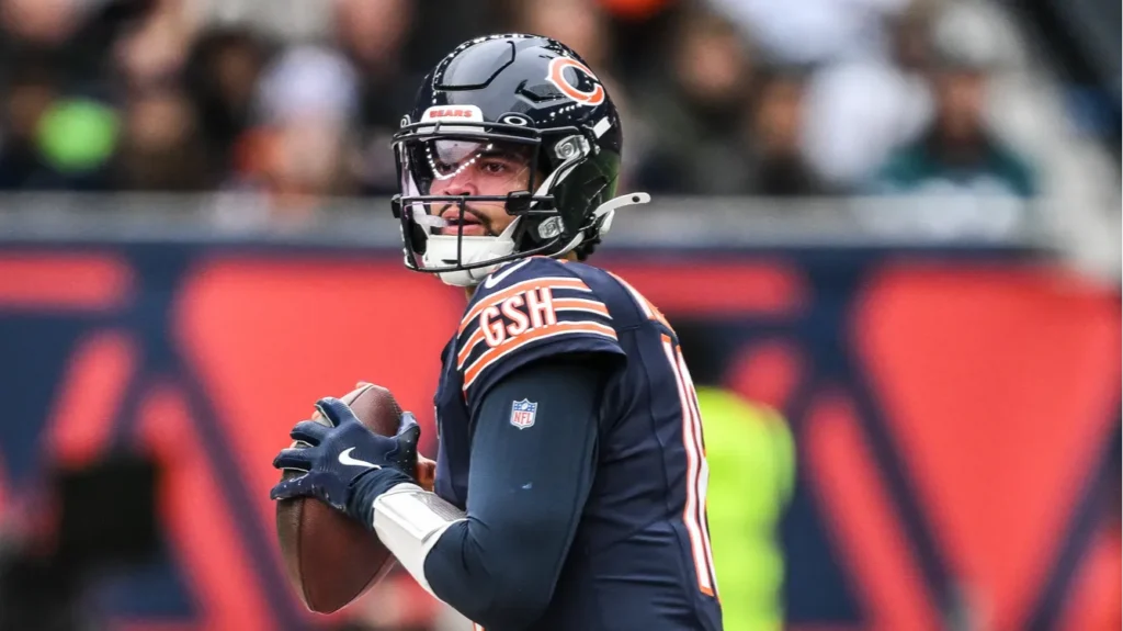caleb williams of the chicago bears prepares to throw the