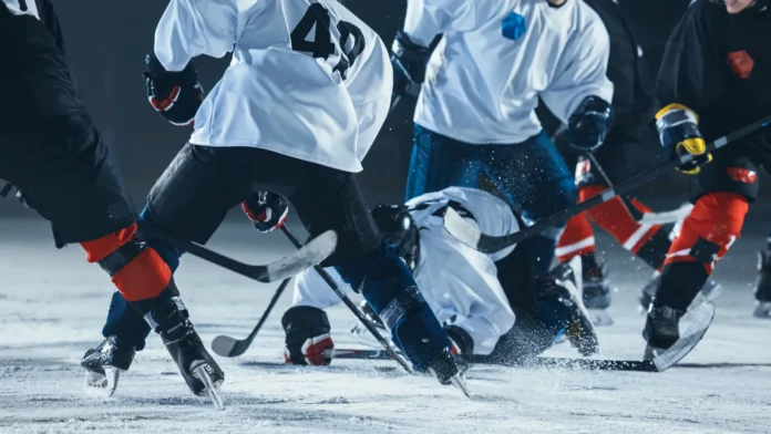 ice hockey rink arena two competitive teams playing and fighting