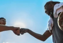 NBA duos that worked better than expected low angle view of two basketball players fistbumping against blue