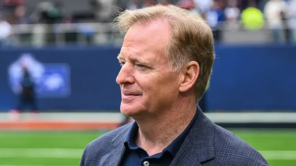 nfl commissioner roger goodell chats to louis reeszammit of the
