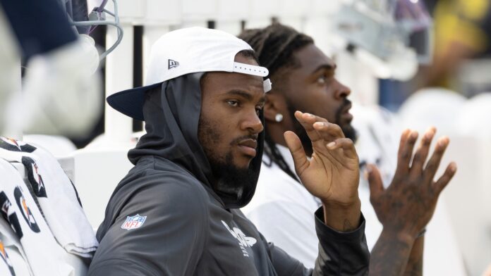 Cowboys,Defensive,End,Micah,Parsons,#11,Is,Seen,Prior,To Micah Parsons on the bench.