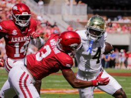Notre Dame taking ball from the other player