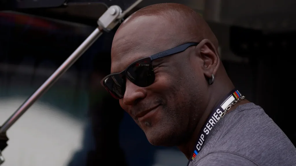 team owner michael jordon watches the federated auto parts 400