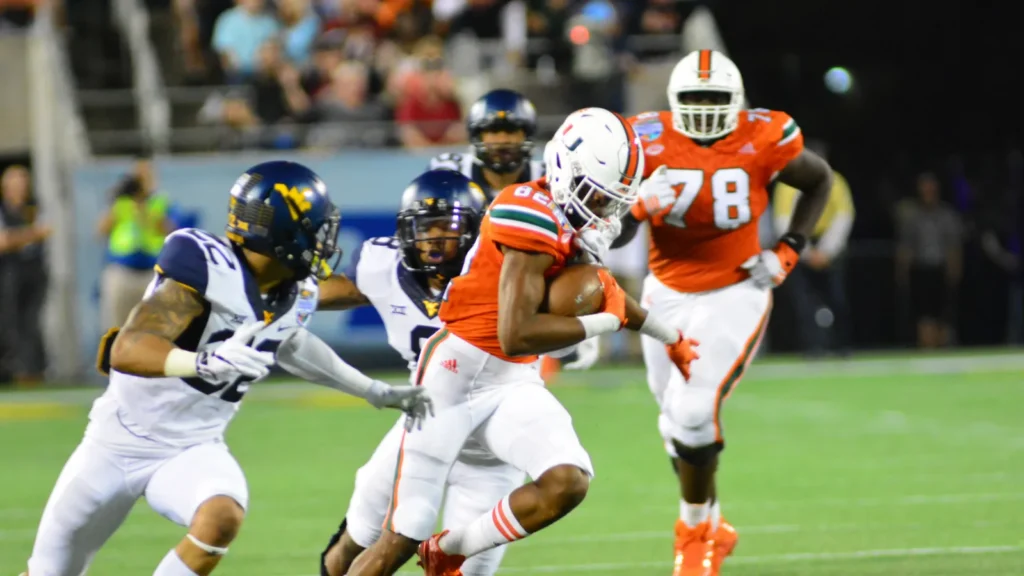 west virginia mountaineers face miami hurricanes during the 71st russell