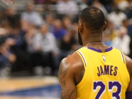 LeBron James lands in an unexpected position on ESPN’s 2026 NBA player rankings Lebron James standing with his back to the camera in the basketball court