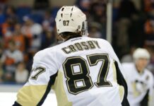 Penguins dominate Islanders as Sidney Crosby makes injury return Sidney Crosby during warm-ups.