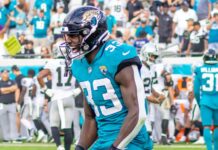 Panthers land LB Devin Lloyd with 3-year, $45M agreement Devin Lloyd celebrating victory.