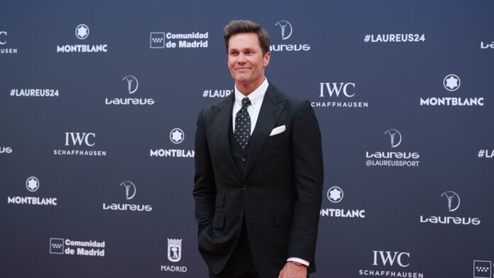 Shutterstock_Tom Brady _2452791225 Tom Brady at an event.
