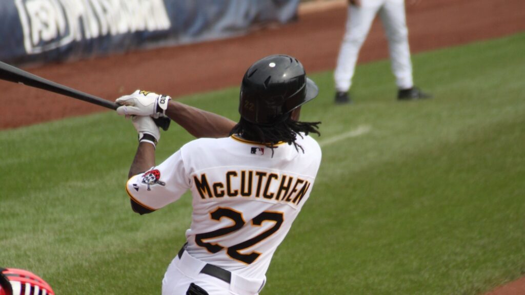 Andrew McCutchen swinging a bat during an MLB game.