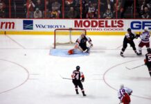 Philadelphia sports scene gets major boost during biggest year yet Philadelphia Flyers goalie in a defensive stance during an NHL game.