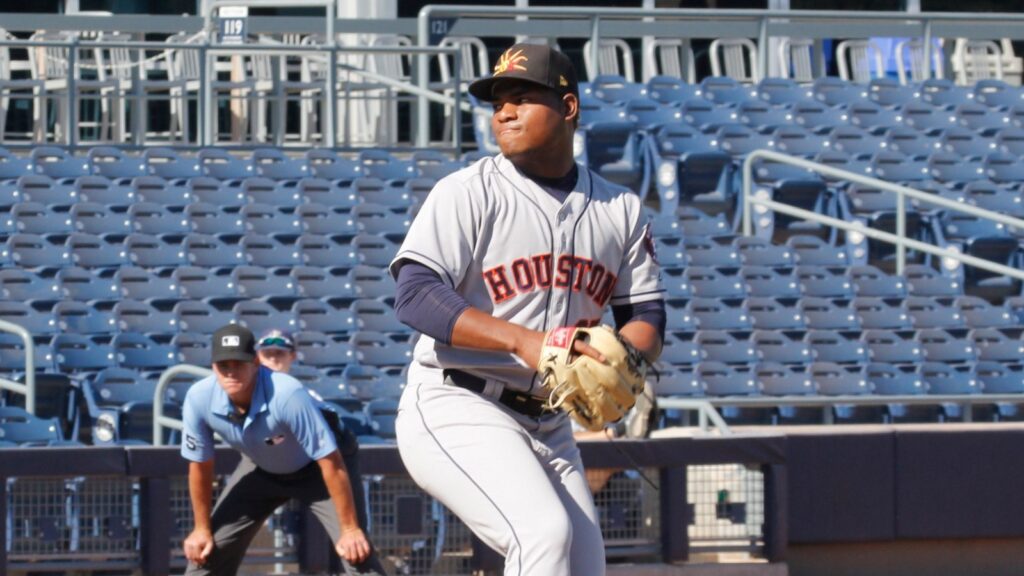Framber Valdez in action during a baseball match.