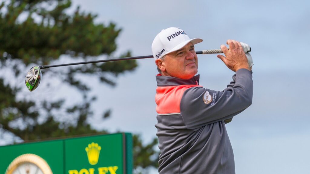 Golfer Paul Lawrie in action while playing golf.