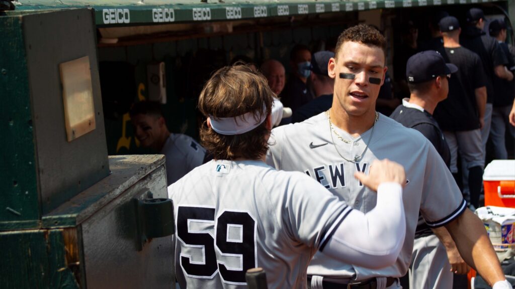 New York Yankees' Luke Voit #59 and Aaron Judge #99 do a pregame handshake before game
