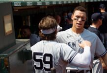 How Aaron Judge turned 15 early homers into a Yankees history moment New York Yankees' Luke Voit #59 and Aaron Judge #99 do a pregame handshake before game