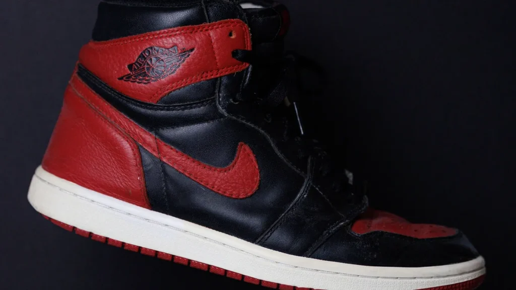 a vertical shot of a modern black and red air